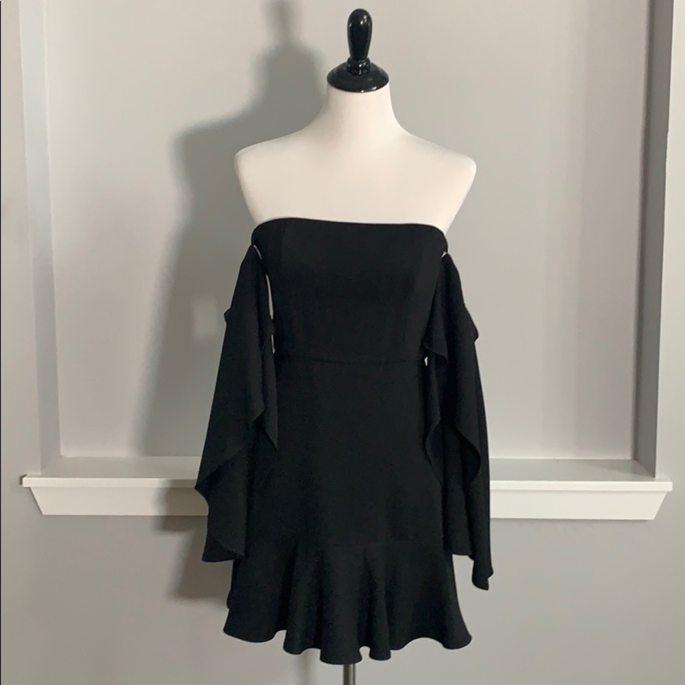Little black dress with decorative arm sleeves